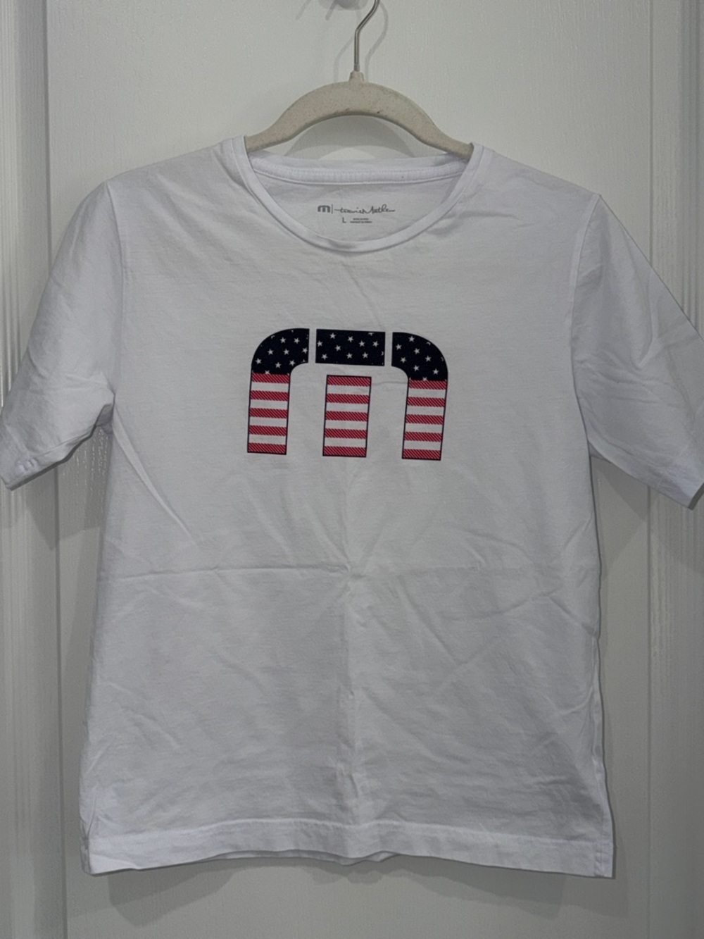 Travis Mathew boys White Tee with American Flag logo size large